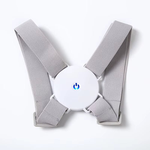 Gray smart posture corrector with a white vibrator on the center